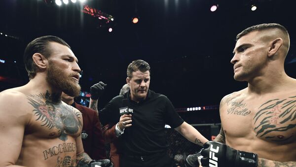 A photo of the McGregor-Poitier UFC bout in 2014 posted on Twitter December 27, 2020 - Sputnik International