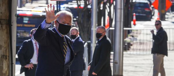 U.S. President-elect Joe Biden waves as he arrives at his transition headquarters in Wilmington, Delaware, U.S., December 28, 2020.   - Sputnik International