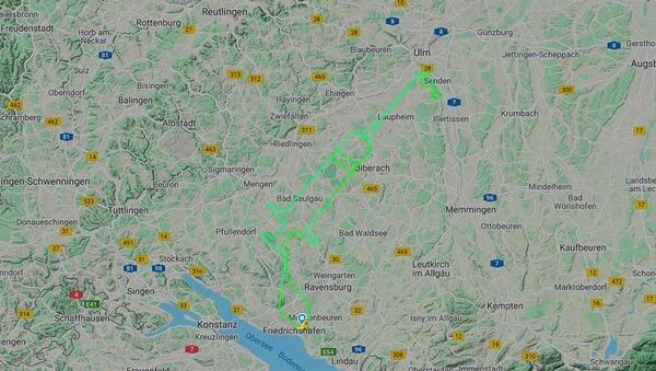 German pilot supports COVID-19 vaccination campaign in Germany and the European Union by tracing giant syringe in the sky on Sunday 27 December 2020. - Sputnik International