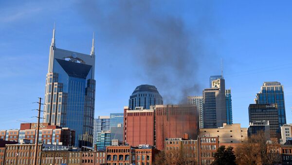 Smoke billows from the site of an explosion in the area of Second and Commerce in Nashville, Tennessee, U.S. December 25, 2020. - Sputnik International