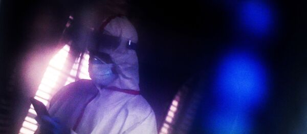 A healthcare worker is seen as healthcare workers treat patients infected with the coronavirus disease (COVID-19) at United Memorial Medical Center in Houston, Texas, U.S., December 28, 2020.  - Sputnik International