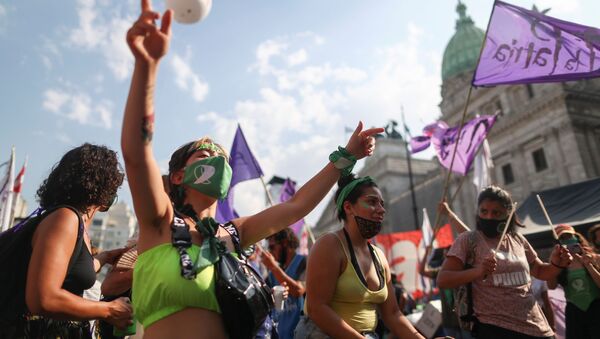 Demonstrators protest in favour of legalizing abortion outside the National Congress in Buenos Aires, Argentina, December 29, 2020.  - Sputnik International