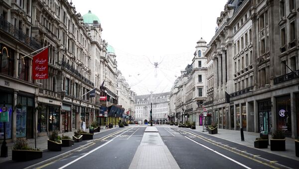 A view of a quiet Regent Street as shops remain closed under Tier 4 restrictions, amid the coronavirus disease (COVID-19) outbreak, in London, Britain, December 26, 2020 - Sputnik International