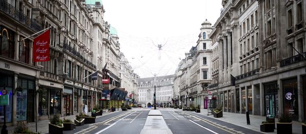 A view of a quiet Regent Street as shops remain closed under Tier 4 restrictions, amid the coronavirus disease (COVID-19) outbreak, in London, Britain, December 26, 2020 A view of a quiet Regent Street as shops remain closed under Tier 4 restrictions, amid the coronavirus disease (COVID-19) outbreak, in London, Britain, December 26, 2020 - Sputnik International