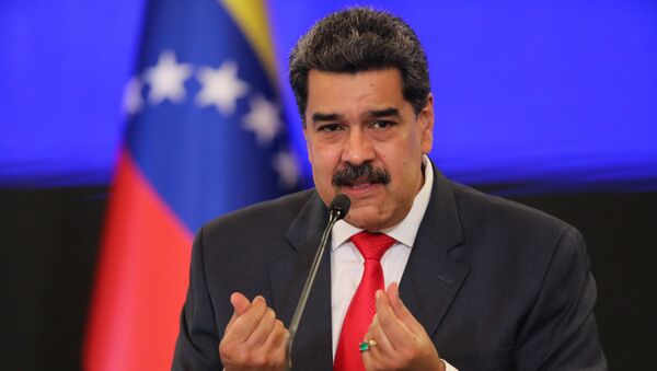 Venezuelan President Nicolas Maduro gestures as he speaks during a press conference following the ruling Socialist Party's victory in legislative elections that were boycotted by the opposition in Caracas, Venezuela December 8, 2020 - Sputnik International