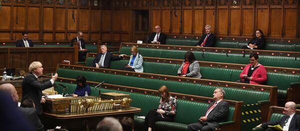 Britain's Prime Minister Boris Johnson speaks during Prime Minister's Questions in the House of Commons in London, Britain 9 December 2020. ©UK Parliament/Jessica Taylor/Handout via REUTERS  THIS IMAGE HAS BEEN SUPPLIED BY A THIRD PARTY. MANDATORY CREDIT. IMAGE MUST NOT BE ALTERED - Sputnik International