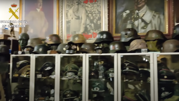 Huge stash of Nazi-era items found in drug and arms bust in Spain. Screengrab of Guardia Civil video. - Sputnik International