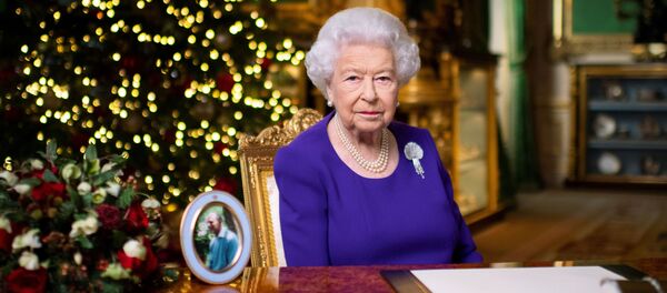 Britain's Queen Elizabeth II records her annual Christmas broadcast in Windsor Castle, Berkshire, Britain December 24, 2020. Picture taken December 24, 2020 Britain's Queen Elizabeth II records her annual Christmas broadcast in Windsor Castle, Berkshire, Britain December 24, 2020. Picture taken December 24, 2020 - Sputnik International
