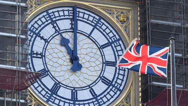 A clockface of the Elizabeth Tower at the Houses of Parliament, more commonly known as Big Ben, shows 1100 GMT, ahead of Britain formally exiting the EU transition period on December 31 at 2300GMT, London, Britain - Sputnik International