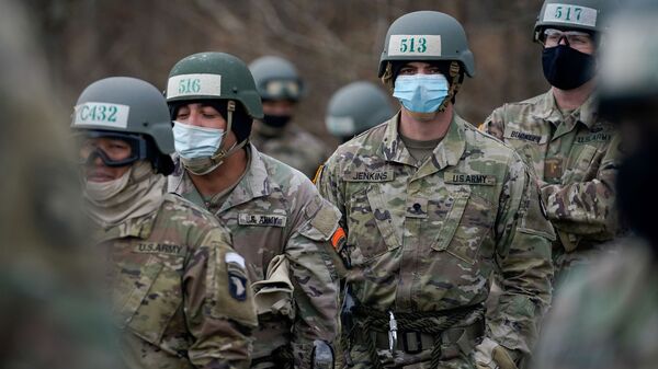 Soldiers at the U.S. Army Air Assault School conduct training while adhering to coronavirus disease (COVID-19) recommendations, at Fort Campbell, Kentucky, U.S. December 3, 2020.  - Sputnik International