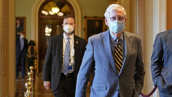 Senate Majority Leader Mitch McConnell of Ky., walks back to his office on Capitol Hill in Washington, Wednesday, Dec. 30, 2020 - Sputnik International