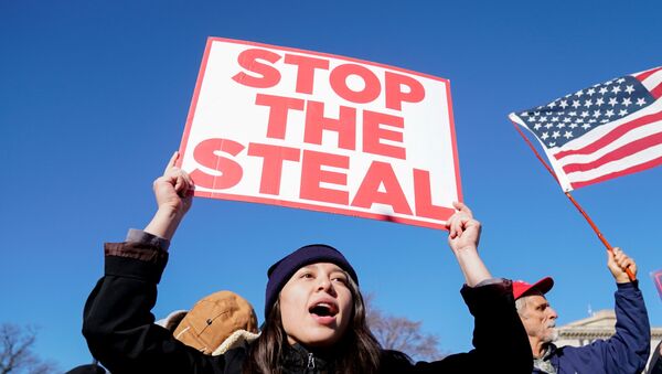 People participate in a Stop the Steal protest outside the U.S. Supreme Court in support of U.S. President Donald Trump in Washington, U.S., December 8, 2020.  - Sputnik International