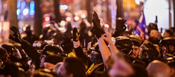Members of the far-right group Proud Boys make 'OK' hand gestures indicating white power, as they gather near Black Lives Matter Plaza in Washington - Sputnik International