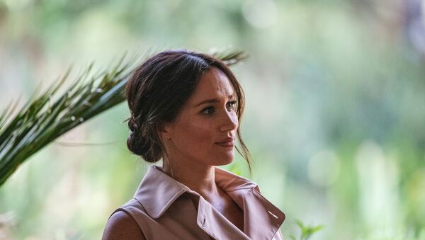 Meghan, the Duchess of Sussex arrives at the British High Commissioner residency where she  will meet with Graca Machel, widow of former South African president Nelson Mandela, in Johannesburg, on October 2, 2019. - Sputnik International