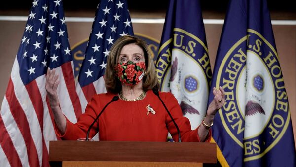Speaker of the House Nancy Pelosi, D-CA., speaks to reporters on an agreement of a coronavirus disease (COVID-19) aid package on Capitol Hill in Washington, D.C., U.S., December 20, 2020 - Sputnik International