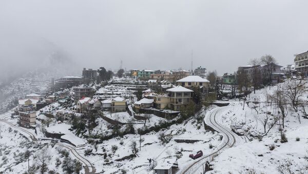 A view of Naddi village covered in snow is pictured in Dharamshala on December 14, 2019.  - Sputnik International
