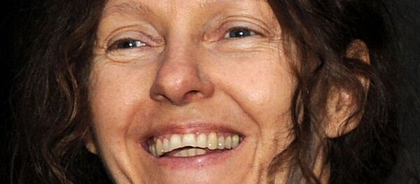 Christine Assange, mother of WikiLeaks founder Julian Assange, sniles as she faces the media outside the High Court, London, Thursday, Dec. 16, 2010. Julian Assange will be freed on bail and sent to stay at a British country mansion, a  judge ruled Thursday, rejecting prosecutors' attempts to keep the WikiLeaks founder in prison as he fights extradition to Sweden.  - Sputnik International