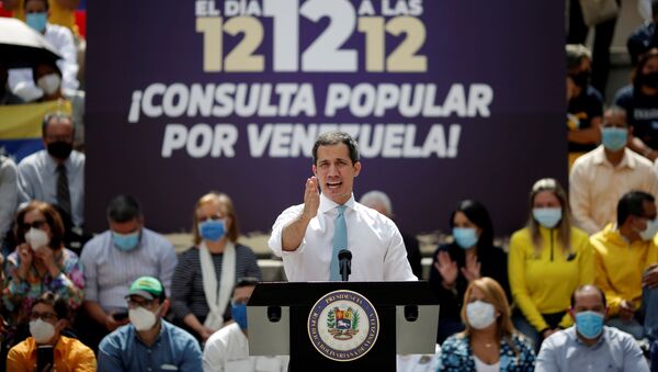 Opposition leader Juan Guaido speaks to the media during a news conference, the day before a popular consultation meant to reject December 6 parliamentary election in Caracas, Venezuela December 11, 2020. REUTERS/Manaure Quintero - Sputnik International