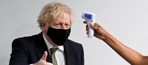 Britain's Prime Minister Boris Johnson visits the Chase Farm Hospital in north London - Sputnik International