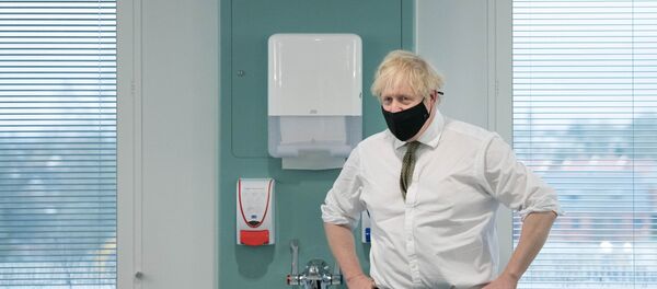 Britain's Prime Minister Boris Johnson visits the Chase Farm Hospital to view the vaccination programme, in north London, Britain January 4, 2021. Britain's Prime Minister Boris Johnson visits the Chase Farm Hospital to view the vaccination programme, in north London, Britain January 4, 2021. - Sputnik International