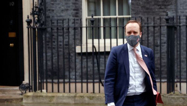 Britain's Health Secretary Matt Hancock leaves Downing Street, in London, Britain, January 4, 2021. - Sputnik International