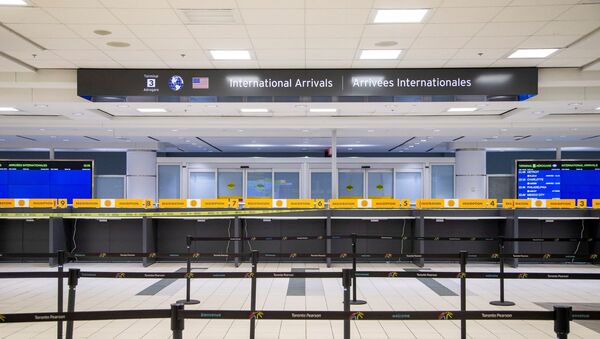 An empty terminal 3, amid a spike in coronavirus disease (COVID-19) cases, at Pearson airport near Toronto, Ontario, Canada December 30, 2020. - Sputnik International