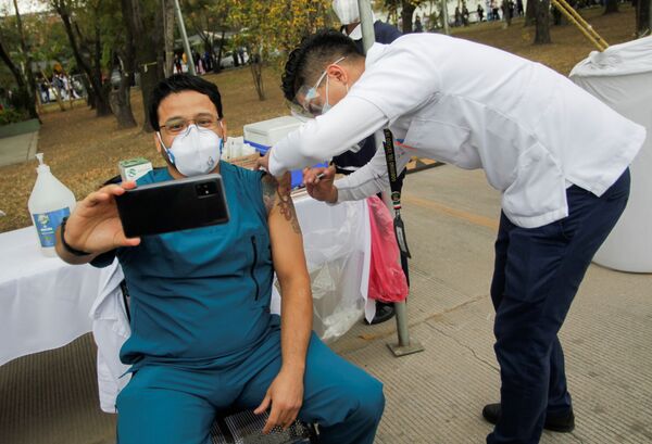War on the Pandemic: Mass Anti-Coronavirus Vaccination Campaigns Around the World - Sputnik International