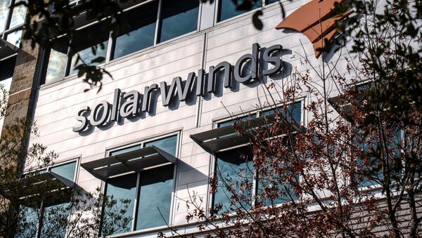 The SolarWinds logo is seen outside its headquarters in Austin, Texas, U.S., December 18, 2020. - Sputnik International