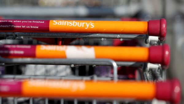 Shopping trolleys outside a Sainsbury's supermarket in Durham, as the spread of the coronavirus disease (COVID-19) continues, Durham, Britain, 8 April 2020 - Sputnik International