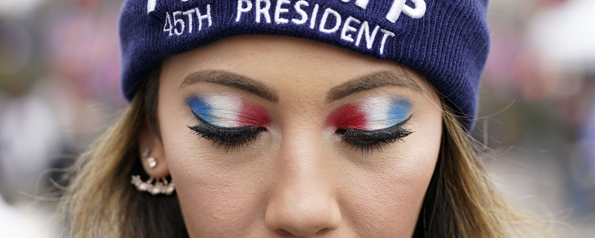A person attends a rally at Freedom Plaza Tuesday, Jan. 5, 2021, in Washington, in support of President Donald Trump.  - Sputnik International, 1920, 13.01.2021