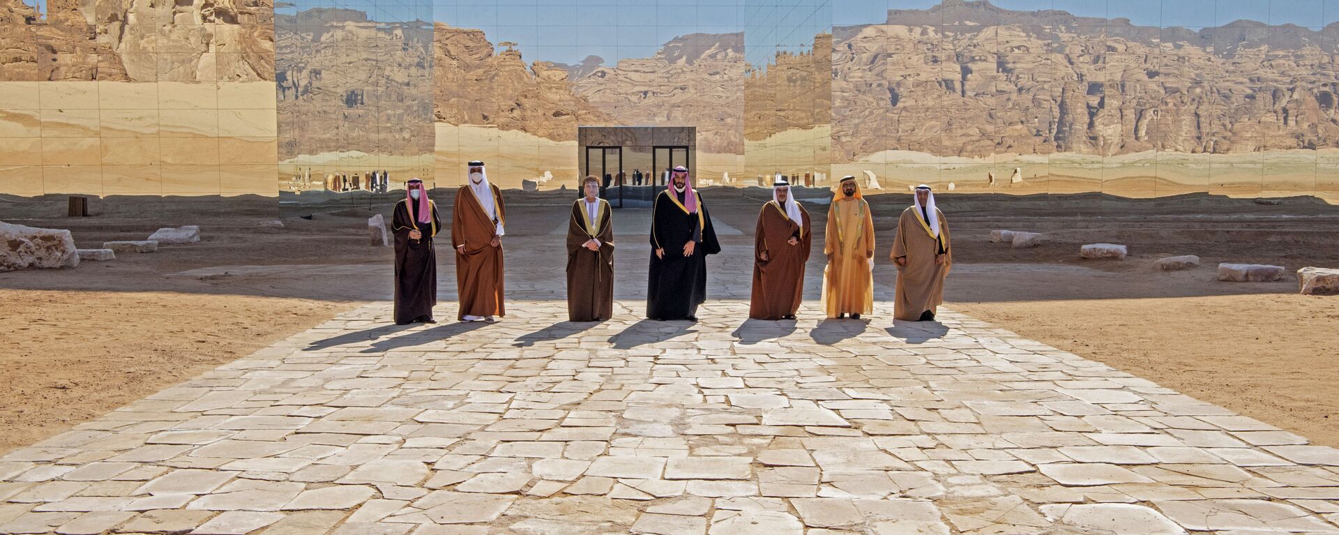 A handout picture provided by the Saudi Royal Palace on January 5, 2021, shows from L to R: Kuwaiti Emir Sheikh Nawaf al-Ahmad Al-Sabah, Emir of Qatar Tamim bin Hamad Al-Thani, Omani Deputy Prime Minister Fahd Bin Mahmud, Saudi Crown Prince Mohammed bin Salman, Bahrain's Crown Prince Salman bin Hamad Al-Khalifa, Dubai's Ruler and UAE Vice President Sheikh Mohammed bin Rashid Al-Maktoum and Nayef al-Hajraf, secretary-general of the Gulf Cooperation Council (GCC) posing for a pictures before the opening session of the 41st Gulf Cooperation Council (GCC) summit in the northwestern Saudi city of al-Ula. - Saudi Arabia's Crown Prince Mohammed bin Salman said that the Gulf states had signed an agreement on regional solidarity and stability at a summit aimed at resolving a three-year embargo against Qatar.  - Sputnik International, 1920, 10.08.2023