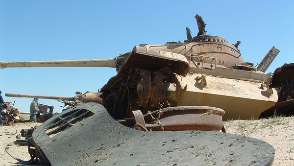 A shoe sole and rusting tanks lie along the Highway of Death in 2003 - Sputnik International