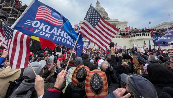 Demonstrators protest outside US Capitol Building in Washington to contest the certification of the 2020 presidential election results by the US Congress, 6 January 2021 - Sputnik International