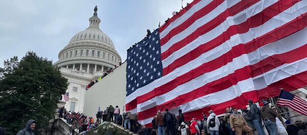 Demonstrators protest outside US Capitol Building in Washington to contest the certification of the 2020 presidential election results by the US Congress, 6 January 2021 Demonstrators protest outside US Capitol Building in Washington to contest the certification of the 2020 presidential election results by the US Congress, 6 January 2021 - Sputnik International