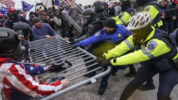 Trump supporters try to break through a police barrier, Wednesday, Jan. 6, 2021, at the Capitol in Washington - Sputnik International