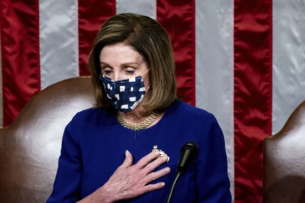 Speaker of the House Nancy Pelosi speaks in the House Chamber after they reconvened for arguments over the objection of certifying Arizona’s Electoral College votes in November’s election, at the Capitol in Washington, Wednesday, 6 January 2021 - Sputnik International