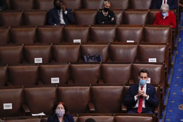 Sen. Josh Hawley, R-Mo., listens as a joint session of the House and Senate reconvenes to confirm the Electoral College votes at the Capitol, Wednesday, 6 January 2021 - Sputnik International