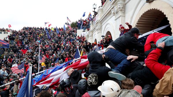 Pro-Trump protesters storm into the US Capitol during clashes with police, during a rally to contest the certification of the 2020 US presidential election results by the US Congress, in Washington, US, 6 January 2021 - Sputnik International