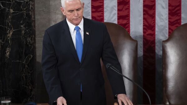 Vice President Mike Pence officiates as a joint session of the House and Senate convenes to confirm the Electoral College votes cast in November's election, at the Capitol in Washington, Wednesday, Jan. 6, 2021 - Sputnik International