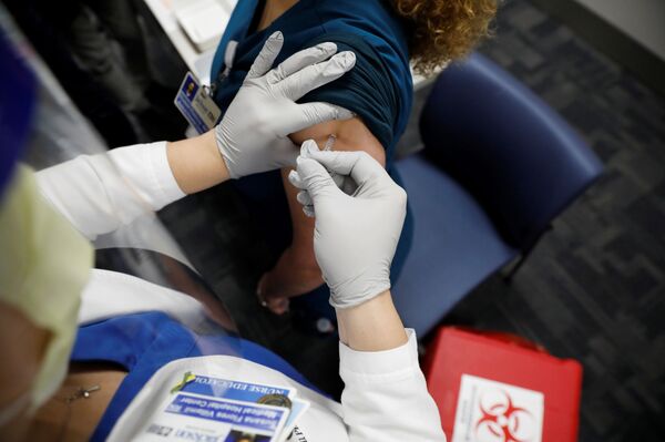 What's Wrong With Vaccine Distribution in the US, and Can Biden's Administration Affect It? - Sputnik International