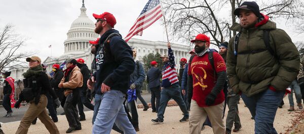 Members of the the far-right group Proud Boys march to the U.S. Capitol Building in Washington, U.S., January 6, 2021. Members of the the far-right group Proud Boys march to the U.S. Capitol Building in Washington, U.S., January 6, 2021. - Sputnik International