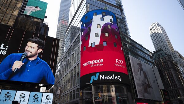 Cloud computing company Rackspace begins trading at the Nasdaq following its initial public offering, Wednesday, Aug. 5, 2020, in New York's Times Square. - Sputnik International