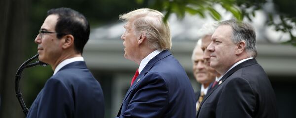 President Donald Trump speaks in the Rose Garden of the White House, Friday, May 29, 2020, in Washington, as from left, Treasury Secretary Steven Mnuchin, White House trade adviser Peter Navarro, left, White House national security adviser Robert O'Brien, and Secretary of State Mike Pompeo, listen - Sputnik International