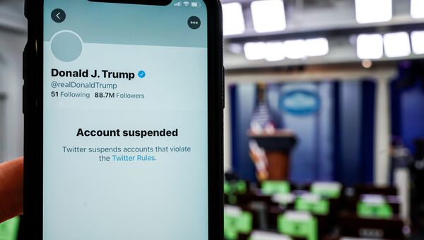 A photo illustration shows the suspended Twitter account of U.S. President Donald Trump on a smartphone at the White House briefing room in Washington, U.S., January 8, 2021. - Sputnik International