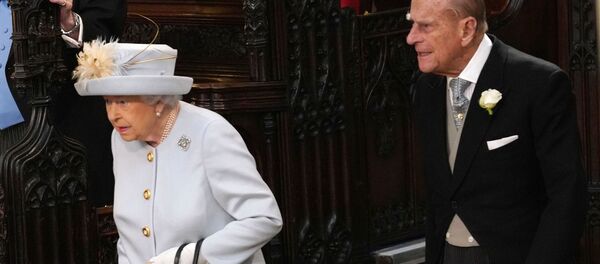 Britain's Queen Elizabeth II (L) and Britain's Prince Philip, Duke of Edinburgh (R) arrive to attend the wedding of Britain's Princess Eugenie of York to Jack Brooksbank at St George's Chapel, Windsor Castle, in Windsor, on October 12, 2018. Britain's Queen Elizabeth II (L) and Britain's Prince Philip, Duke of Edinburgh (R) arrive to attend the wedding of Britain's Princess Eugenie of York to Jack Brooksbank at St George's Chapel, Windsor Castle, in Windsor, on October 12, 2018. - Sputnik International