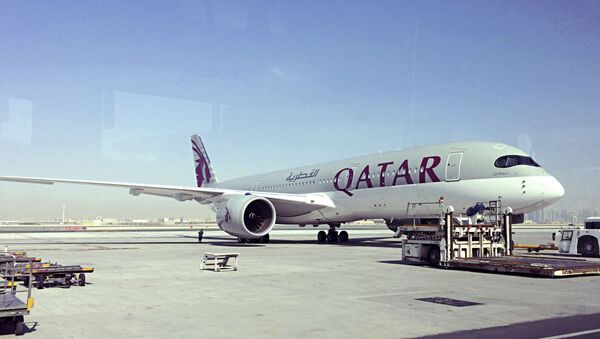 This June 6, 2017, file photo shows a parked Qatari plane in Hamad International Airport in Doha, Qatar.  - Sputnik International