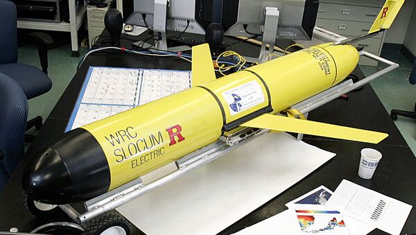 ** ADVANCE FOR MONDAY, JAN. 22 **A Rutgers University underwater robotic glider sits on a table in a laboratory Wednesday, Jan. 17, 2007, in Piscataway, N.J. Five feet long, cylindrical and bright yellow, the underwater robotic gliders look more like torpedoes with wings than sophisticated scientific instruments that could revolutionize research in the most remote seas. One of the gliders deployed two weeks ago off the fast-warming Antarctic Peninsula has collected about two-thirds as much information about ocean temperature, salinity and other conditions affecting the food chain there than ship-based researchers have in a dozen years of month-long summertime visits. (AP Photo/Mel Evans)   - Sputnik International