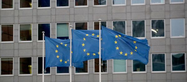 European Union flags flutter outside the European Commission headquarters in Brussels - Sputnik International