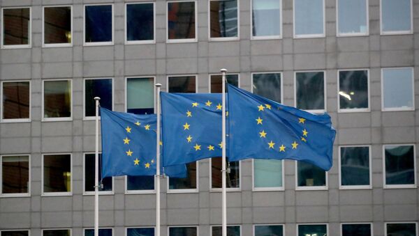 European Union flags flutter outside the European Commission headquarters in Brussels - Sputnik International
