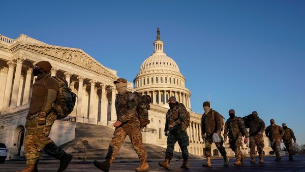 Members of the National Guard arrive at the U.S. Capitol as Democratic members of the House prepare an article of impeachment against U.S. President Donald Trump in Washington, U.S., January 12, 2021 - Sputnik International